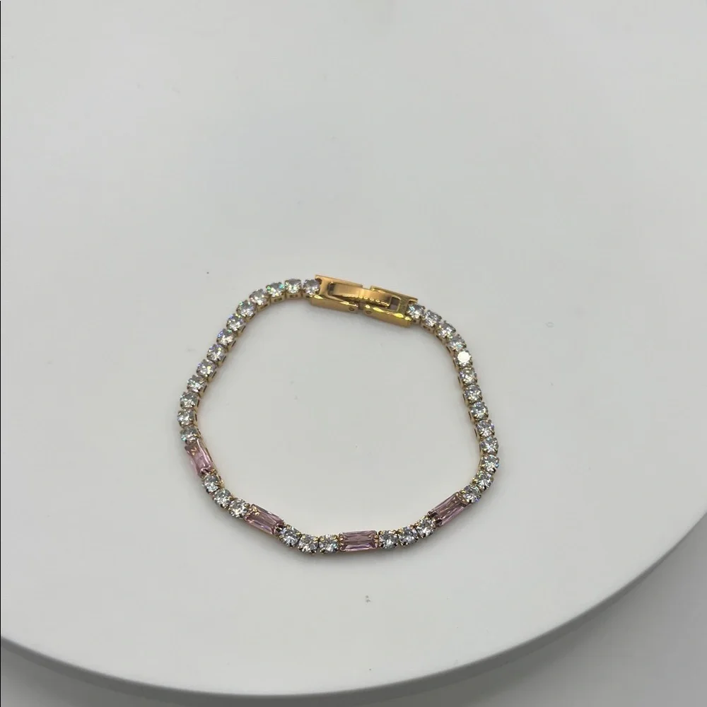 454. Elegant Gold and Pink Bracelet
